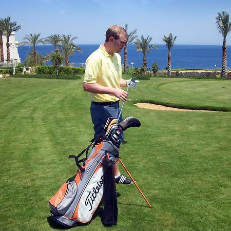 Stella Di Mare Beach Hotel & Spa Sharm el-Sheikh Ngoại thất bức ảnh Golf player with a golf bag